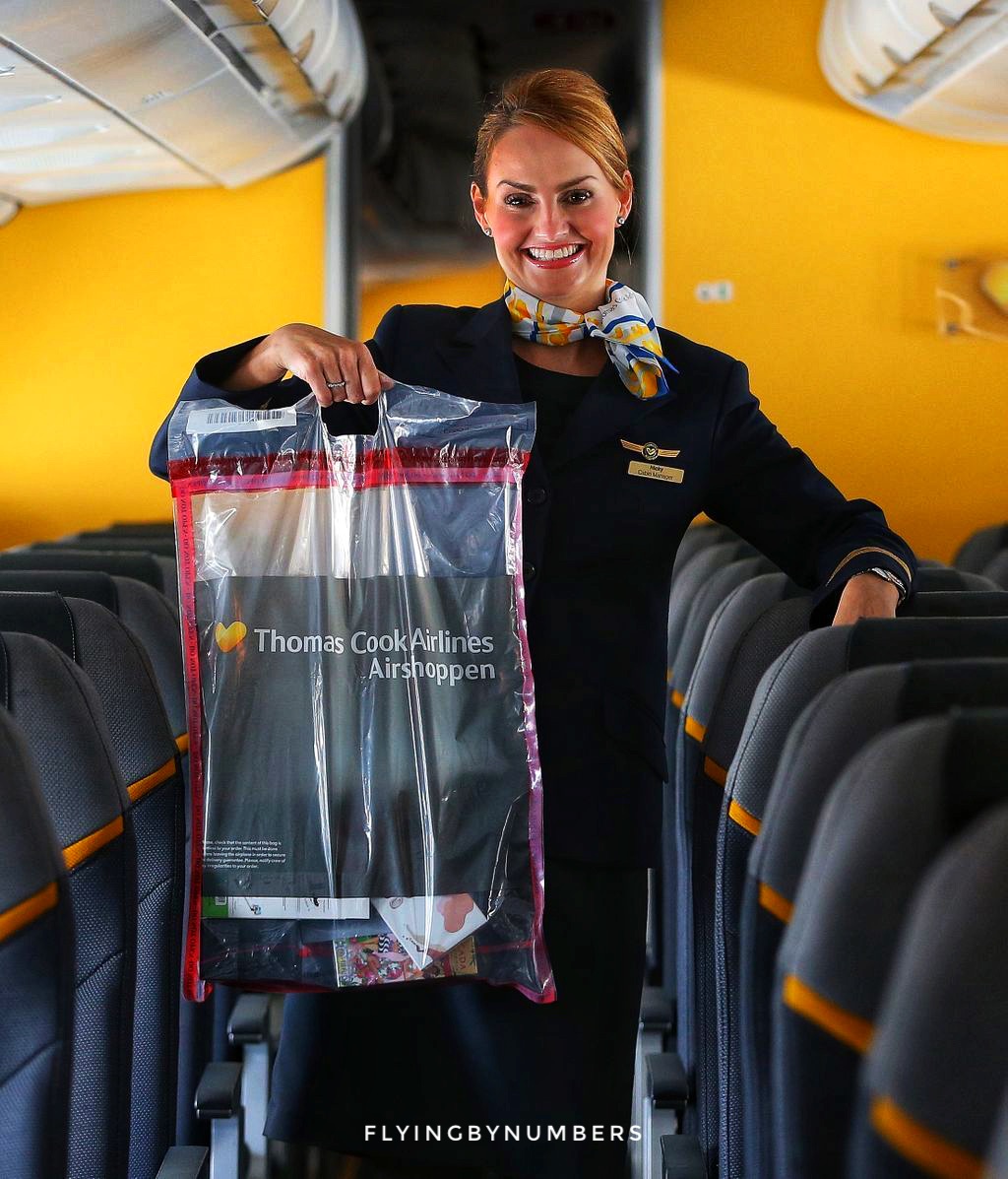 Thomas cook flight attendant with onboard duty free bag
