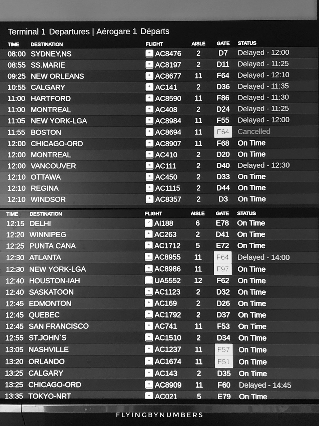 Departures screen showing delayed and cancelled flights