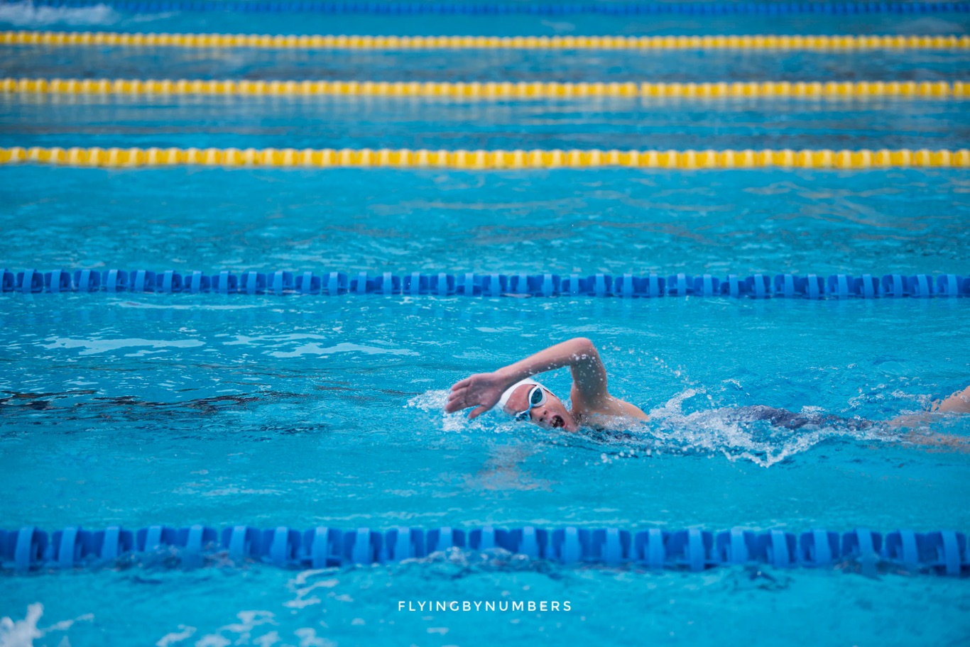 Woman swimming competitively