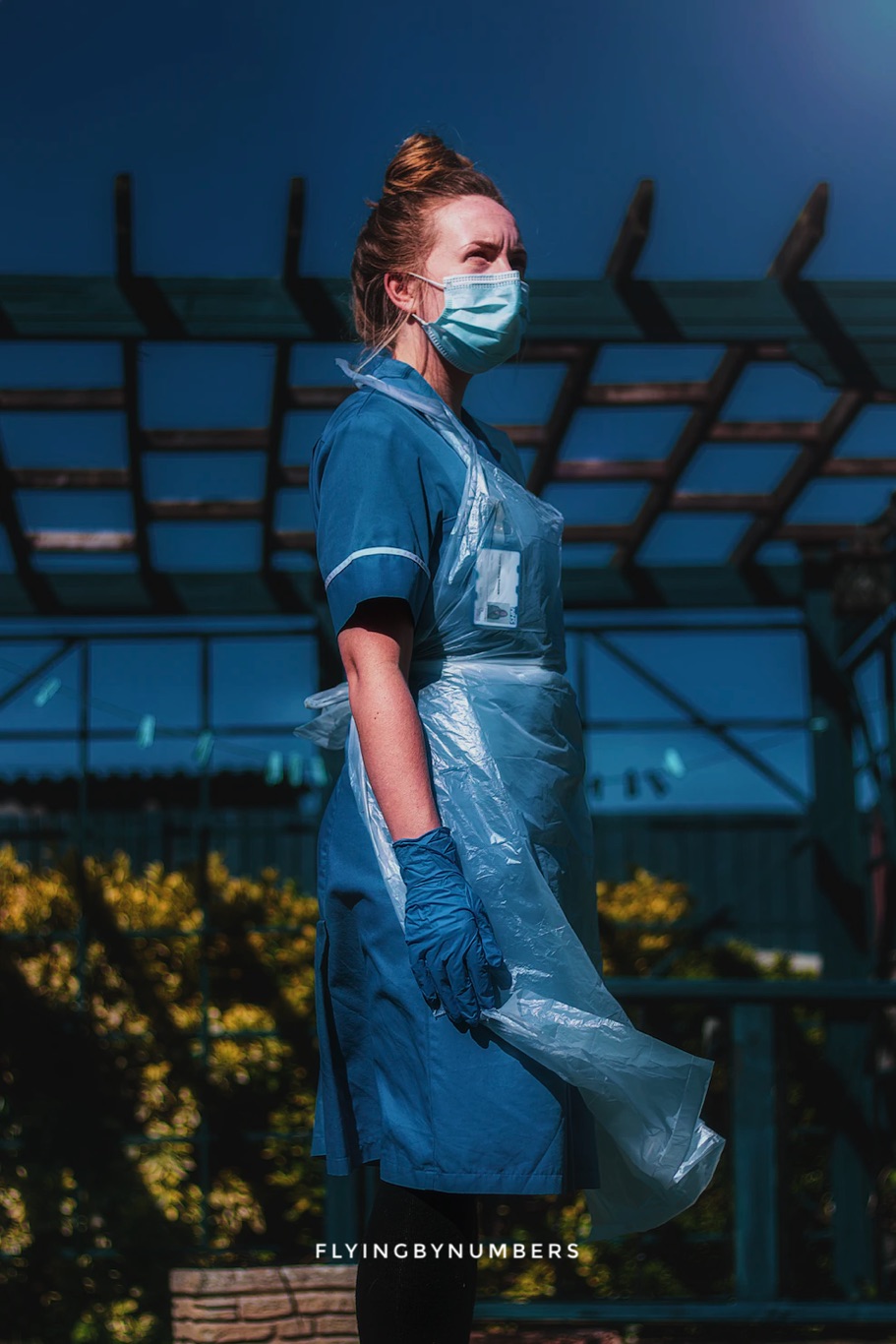 Uk NHS nurse wearing PPE during covid-19 crisis