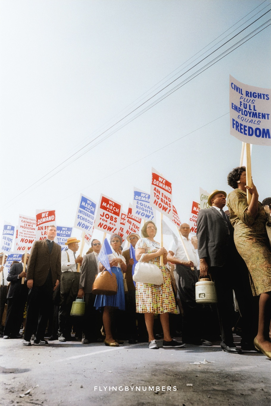 Women and men marching for equality in America during the 1960s