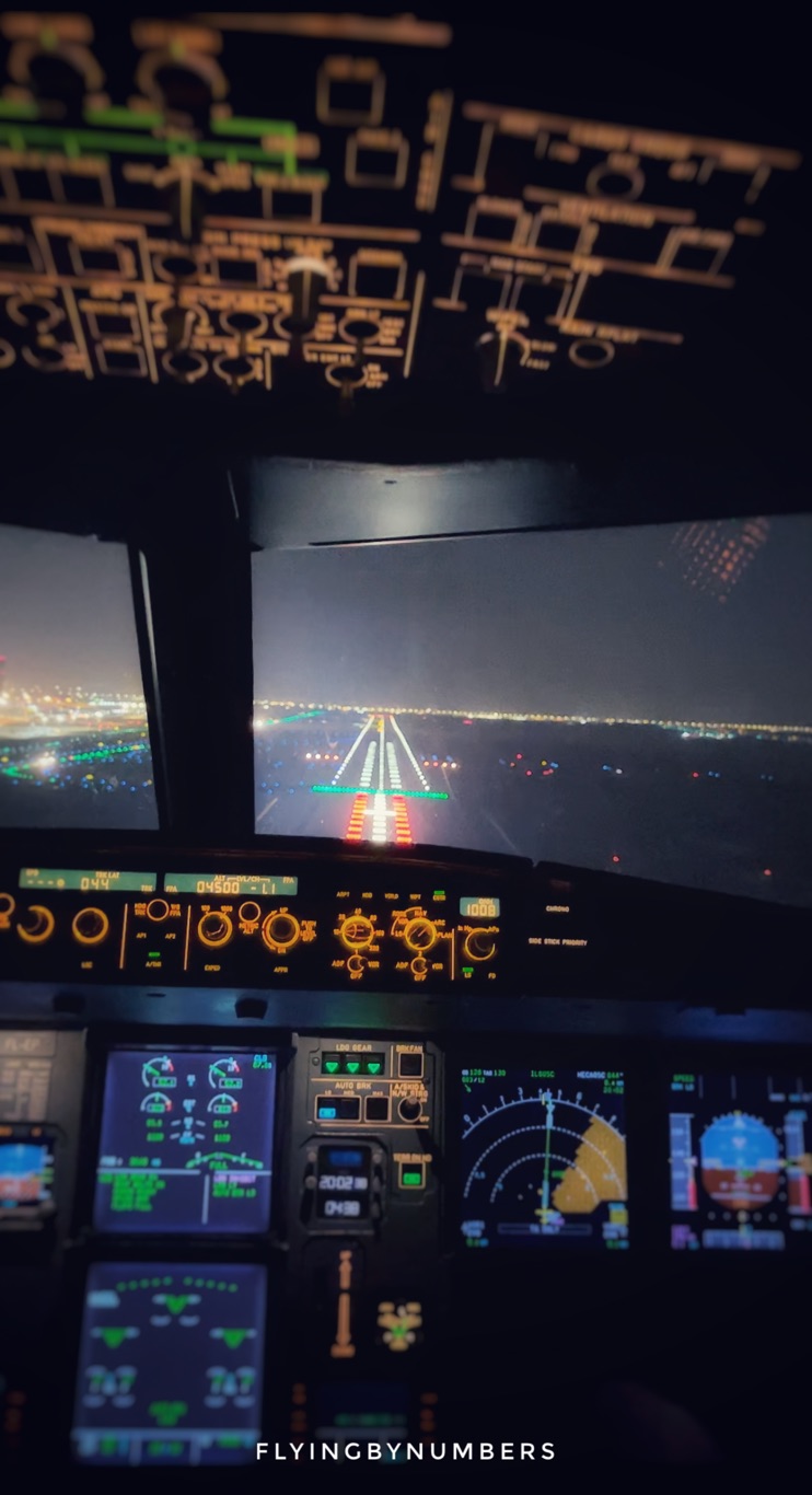Commercial aircraft landing at night