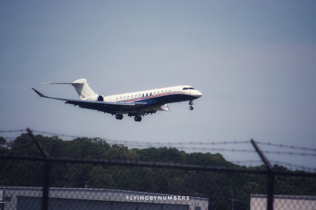 corporate jet on final approach to landing