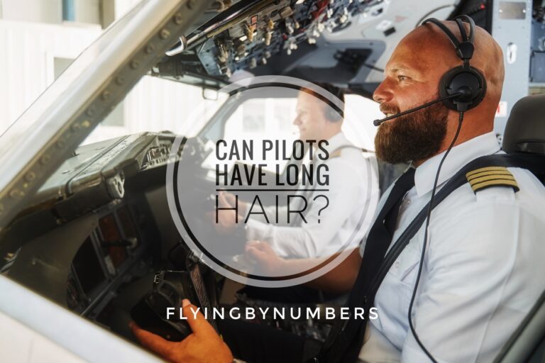 Clean shaven pilot with short haircut and bald pilot with beard