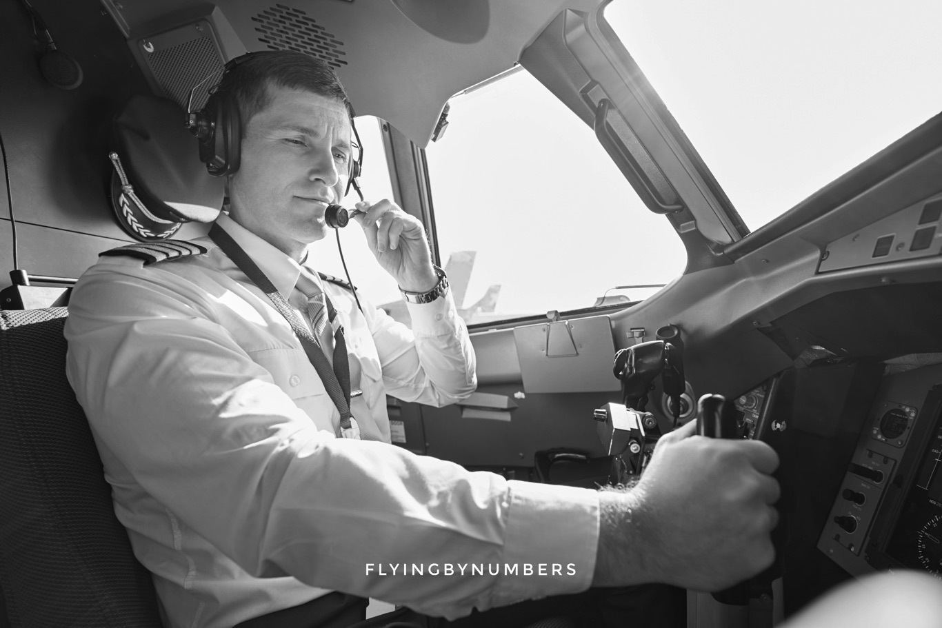 Pilot speaking English in commercial aircraft cockpit